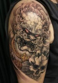 Тату в виде японского льва