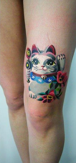 Кошка Манэки-нэко место нанесения тату