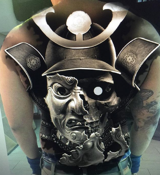 Тату Пола Бута на спине