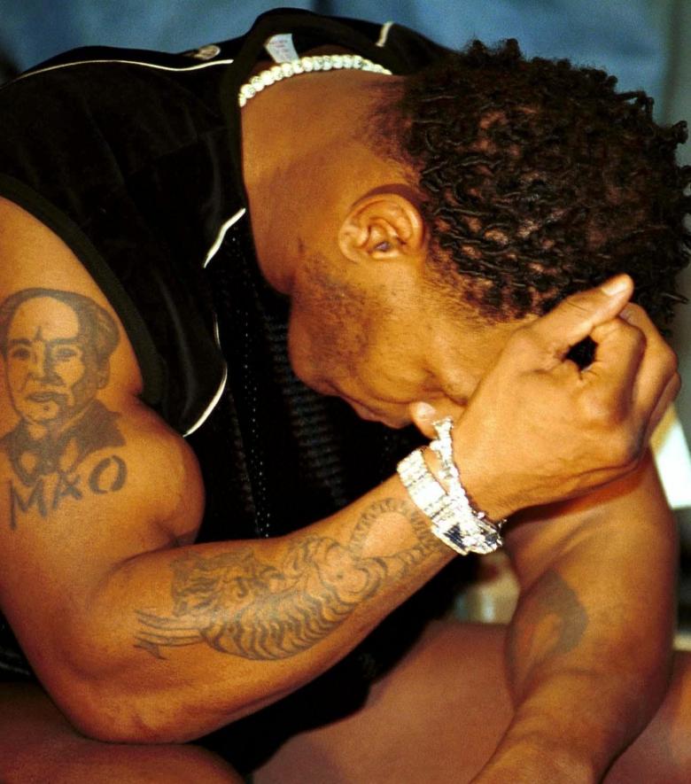 Татуировка Майка Тайсона на правом предплечье