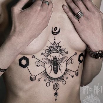 тату на животе женская