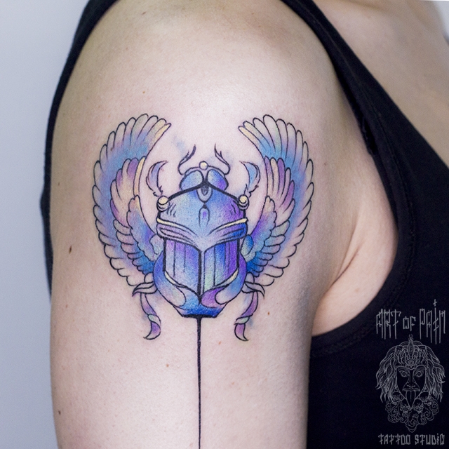 Символизм синего цвета в татуировке