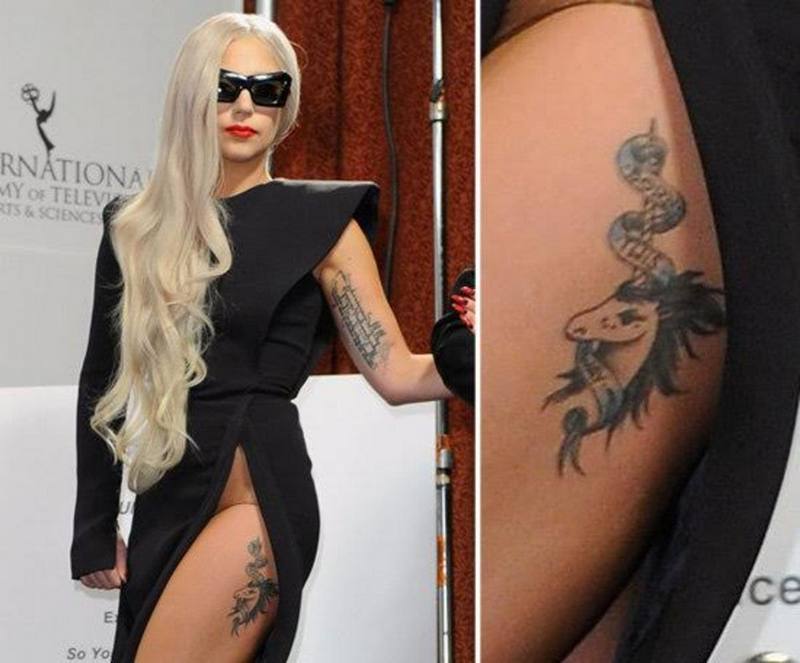 Татуировка Леди Гага на бедре