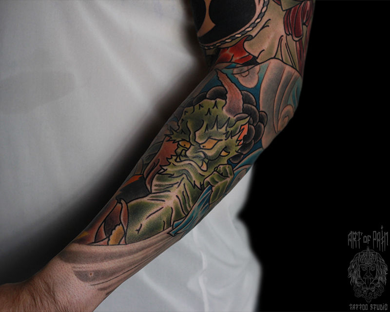 Татуировка мужская япония на предплечье зеленый демон – Мастер тату: Марк Акулов