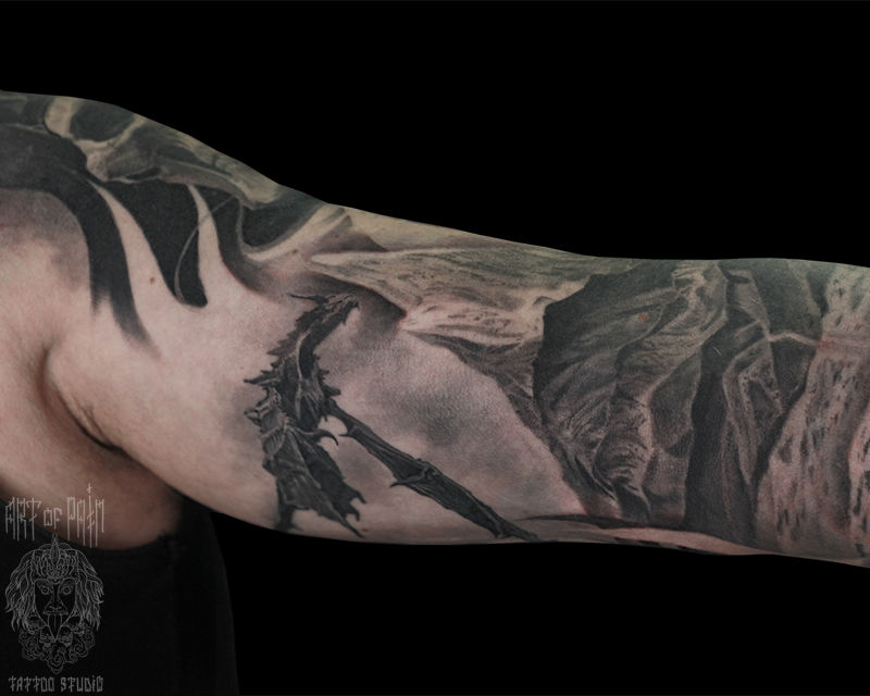Татуировка мужская реализм на руке пейзаж и дракон – Мастер тату: Александр Pusstattoo