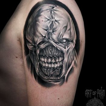 татуировка мужская хоррор на плече зомби с зубами