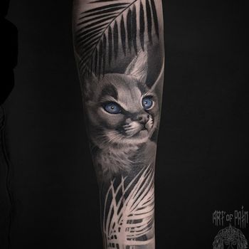 Татуировка женская реализм на предплечье кошка