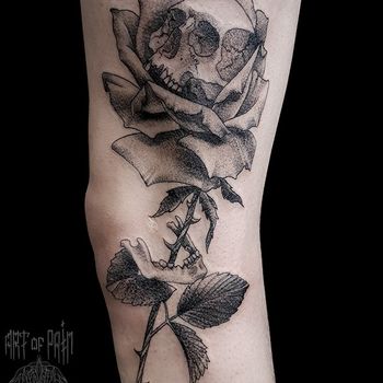 Татуировка мужская дотворк на ноге роза и череп