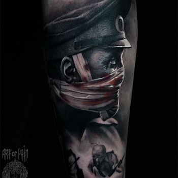 Татуировка мужская реализм на предплечье портрет военного