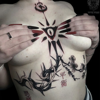 Татуировка женская графика на груди сакура, шипы, иероглифы и узор