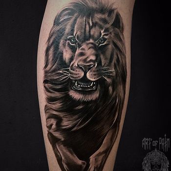 Татуировка мужская реализм на икре лев