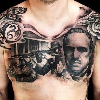 Татуировка мужская реализм на груди Крестный Отец
