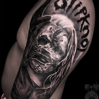 Татуировка мужская хоррор на плече монстр
