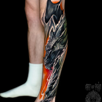 Татуировка мужская реализм на голени дракон