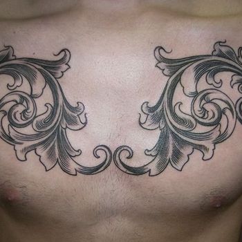 Татуировка мужская графика на груди барокко