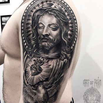 Татуировка мужская чикано на плече иисус