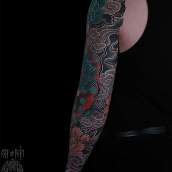 Татуировка мужская япония тату-рукав лев и пион