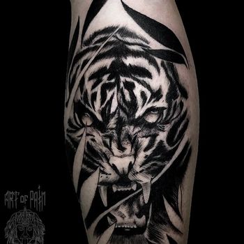 Татуировка мужская графика на голени тигр