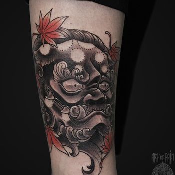 Татуировка женская япония на голени лев