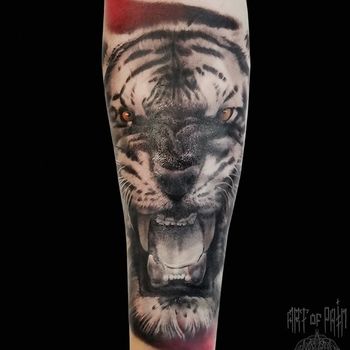 Татуировка мужская реализм на предплечье tiger