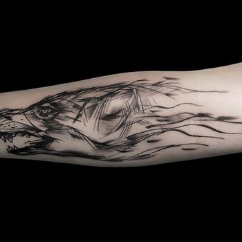 Татуировка мужская графика на предплечье волк