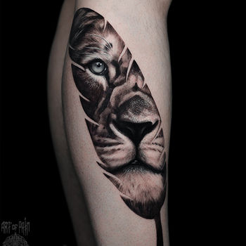 Татуировка мужская реализм на голени лев