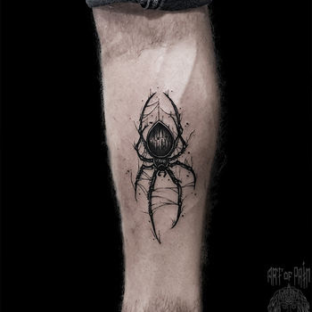 Татуировка мужская графика на голени паук