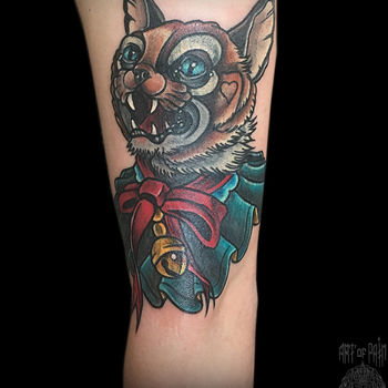 Татуировка женская нью скул на руке кот