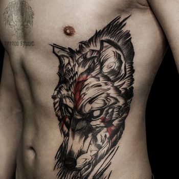 Татуировка мужская графика на боку волк