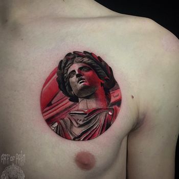 Татуировка мужская реализм на груди портрет