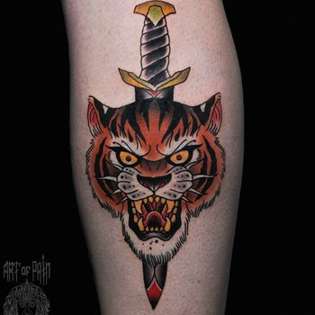 Татуировка мужская олд скул на голени тигр