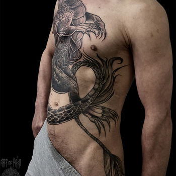 Татуировка мужская графика на груди и животе дракон 