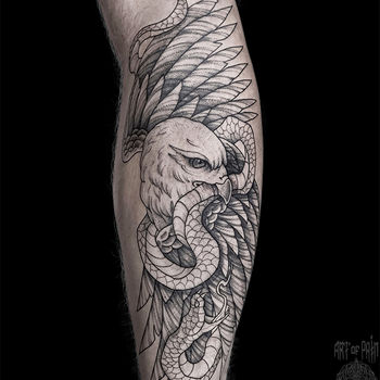 Татуировка мужская графика на голени сокол и змея