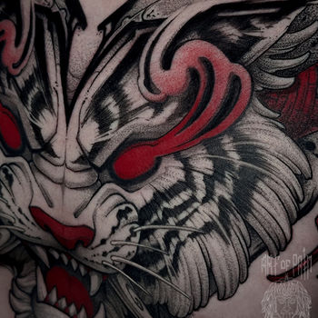 Татуировка мужская япония на груди тигр и огонь