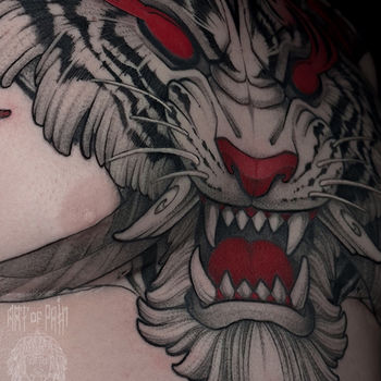 Татуировка мужская япония на груди тигр и огонь