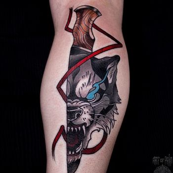 Татуировка мужская нью скул на голени волк