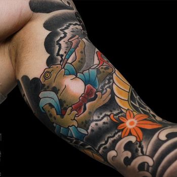 Татуировка мужская япония на руке лягушка