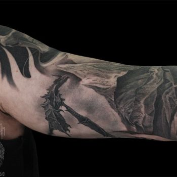 Татуировка мужская реализм на руке пейзаж и дракон
