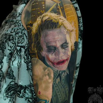 Татуировка мужская реализм на плече Джокер