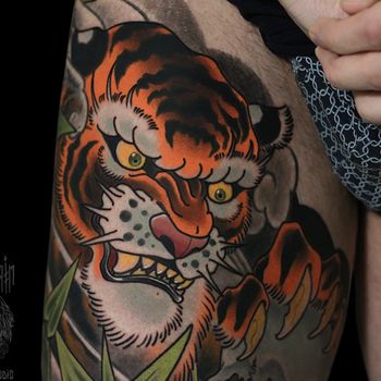 Татуировка мужская япония на бедре тигр