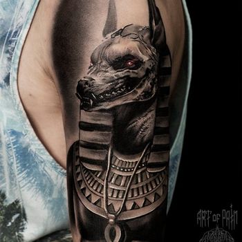 татуировка мужская хоррор на плече египетский бог