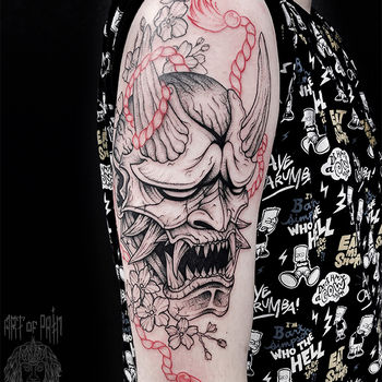 Татуировка мужская графика на плече Ханья