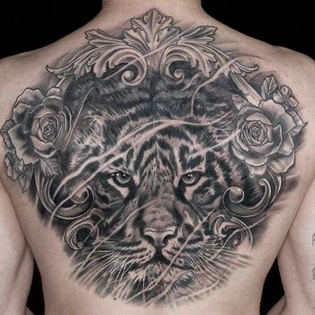 Татуировка мужская чикано на на спине тигр