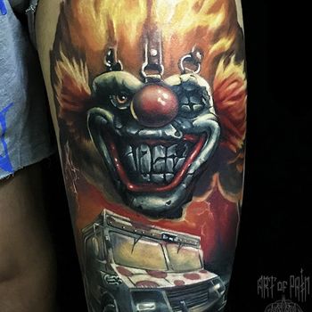 Татуировка мужская реализм на бедре клоун