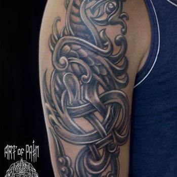 Татуировка мужская кельтика на плече дракон