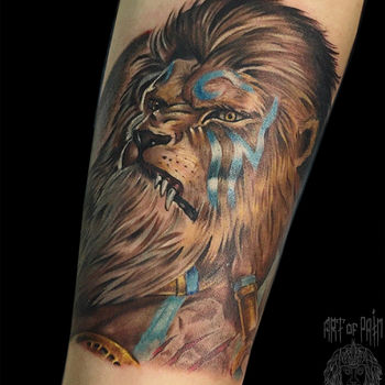 Татуировка мужская нью скул на предплечье лев