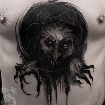 Татуировка мужская хоррор на животе монстр