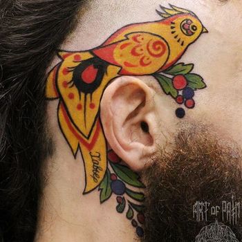 Татуировка мужская олд скул на голове птица