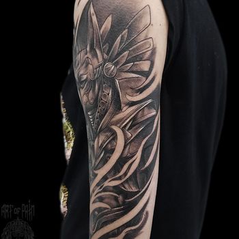 Татуировка мужская нью-скул на плече Анубис
