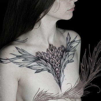 Татуировка женская графика и орнаментал на груди мандала и растение